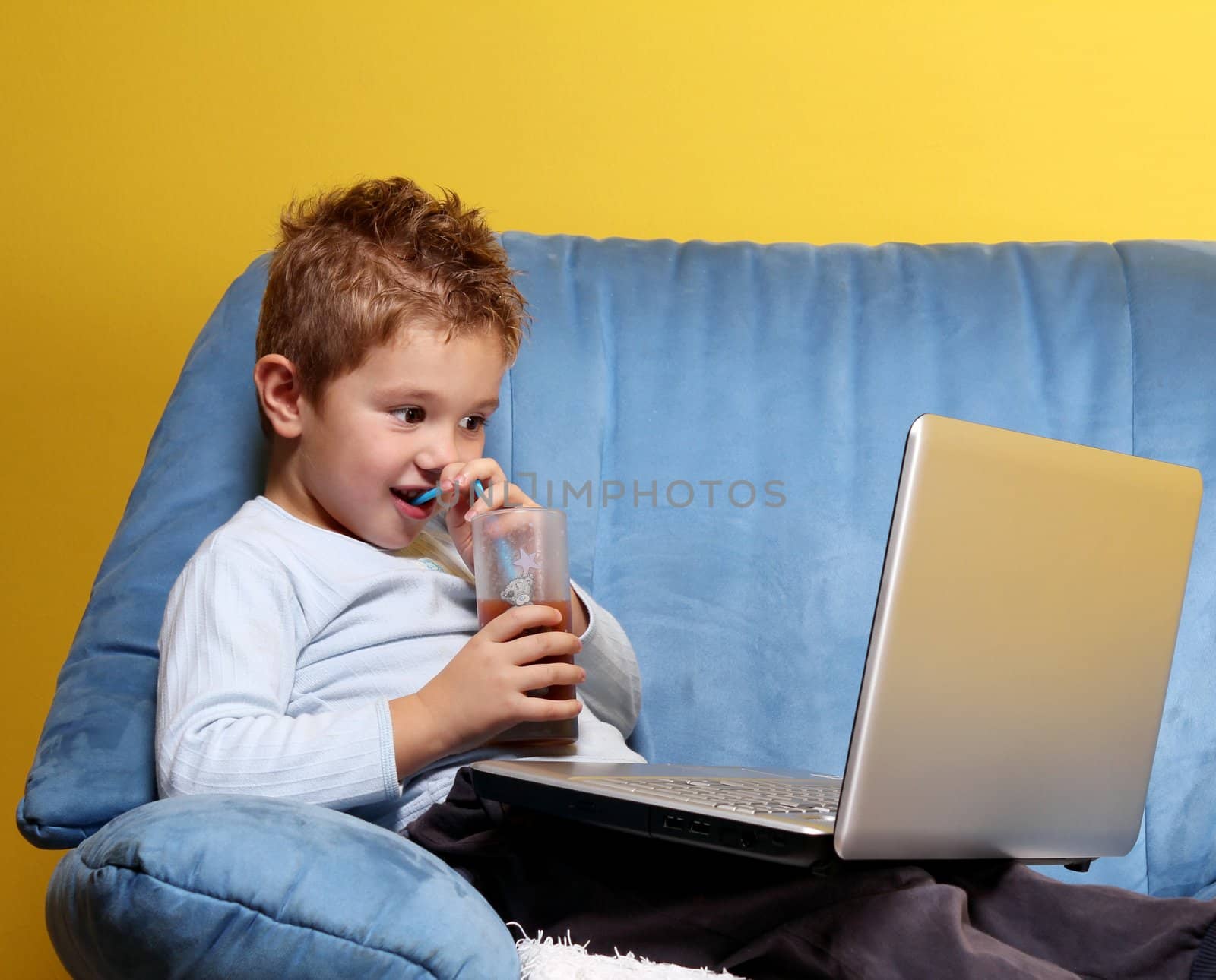 little boy with laptop by goce