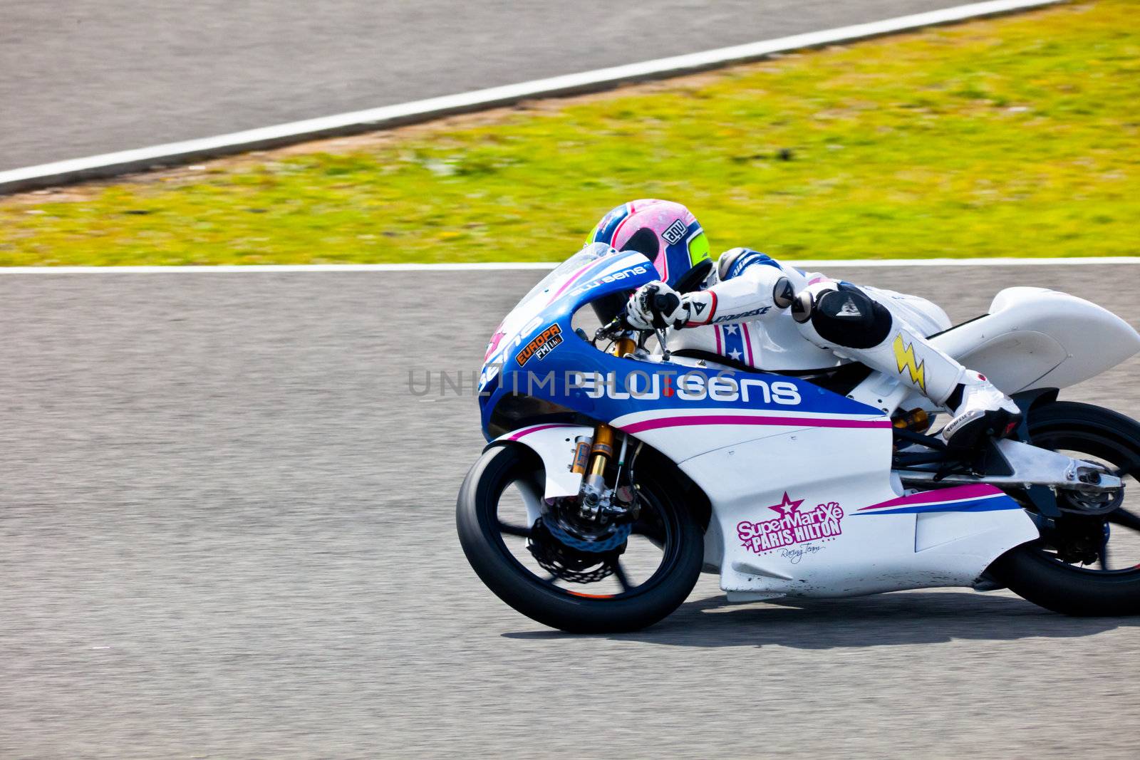 JEREZ DE LA FRONTERA, SPAIN - MAR 5:125cc pilot Sergio Gadea races on the official training of the world championship of MotoGP on Mar 5, 2011, in racetrack of velocity of Jerez de la Frontera, Spain