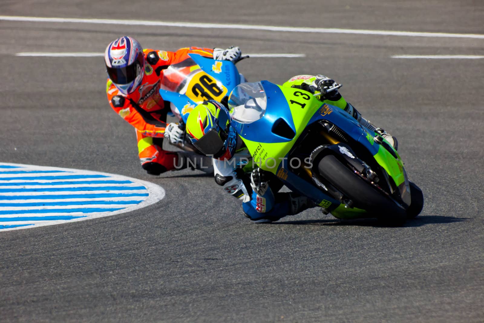 JEREZ DE LA FRONTERA, SPAIN - APR 17: Moto2 motorcyclists Renaud Binoche and Juan David Lopez takes a curve in the CEV Championship race on April 17, 2011 in Jerez de la Frontera, Spain.
