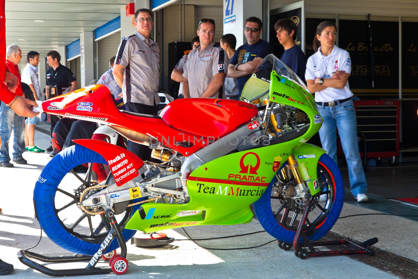 JEREZ DE LA FRONTERA, SPAIN - APR 17: 125cc Motorcycle of Juanfran Guevara waiting in the pitlane in the CEV Championship on April 17, 2011, in Jerez de la Frontera, Spain.