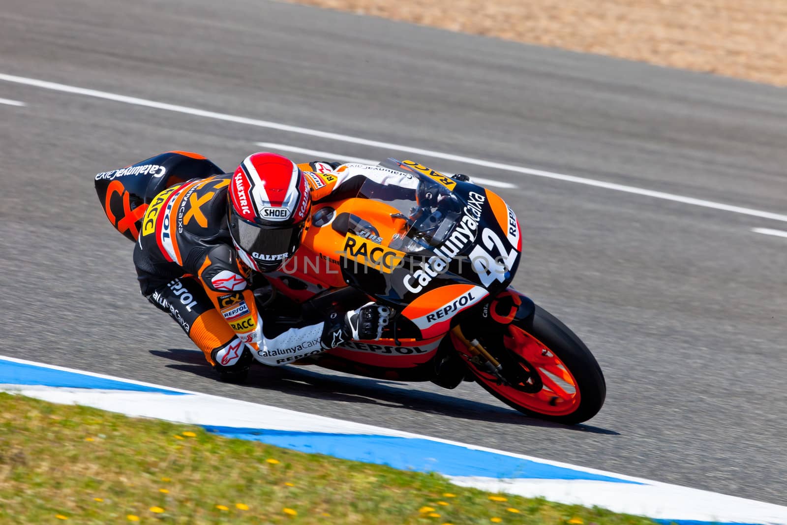 JEREZ DE LA FRONTERA, SPAIN - APR 17: 125cc motorcyclist Alex Rins takes a curve in the CEV Championship race on April 17, 2011 in Jerez de la Frontera, Spain.