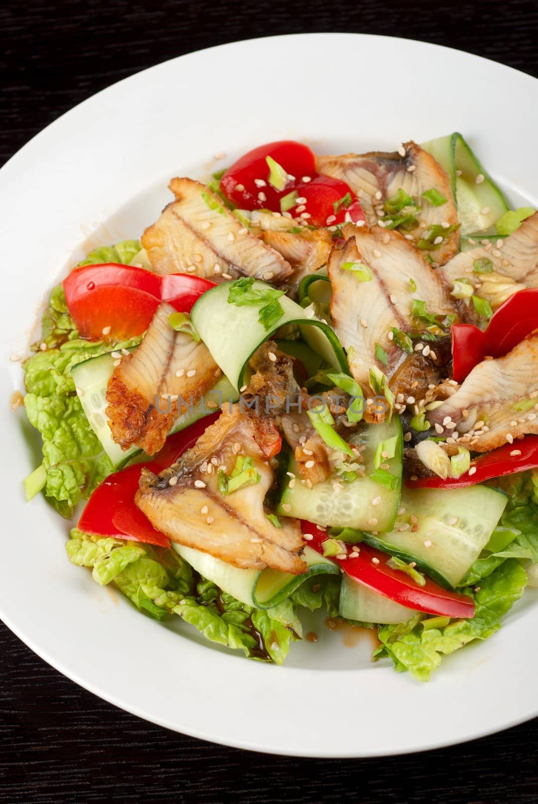 Salad of smoked eel, lettuce,Chinese cabbage and vegetables