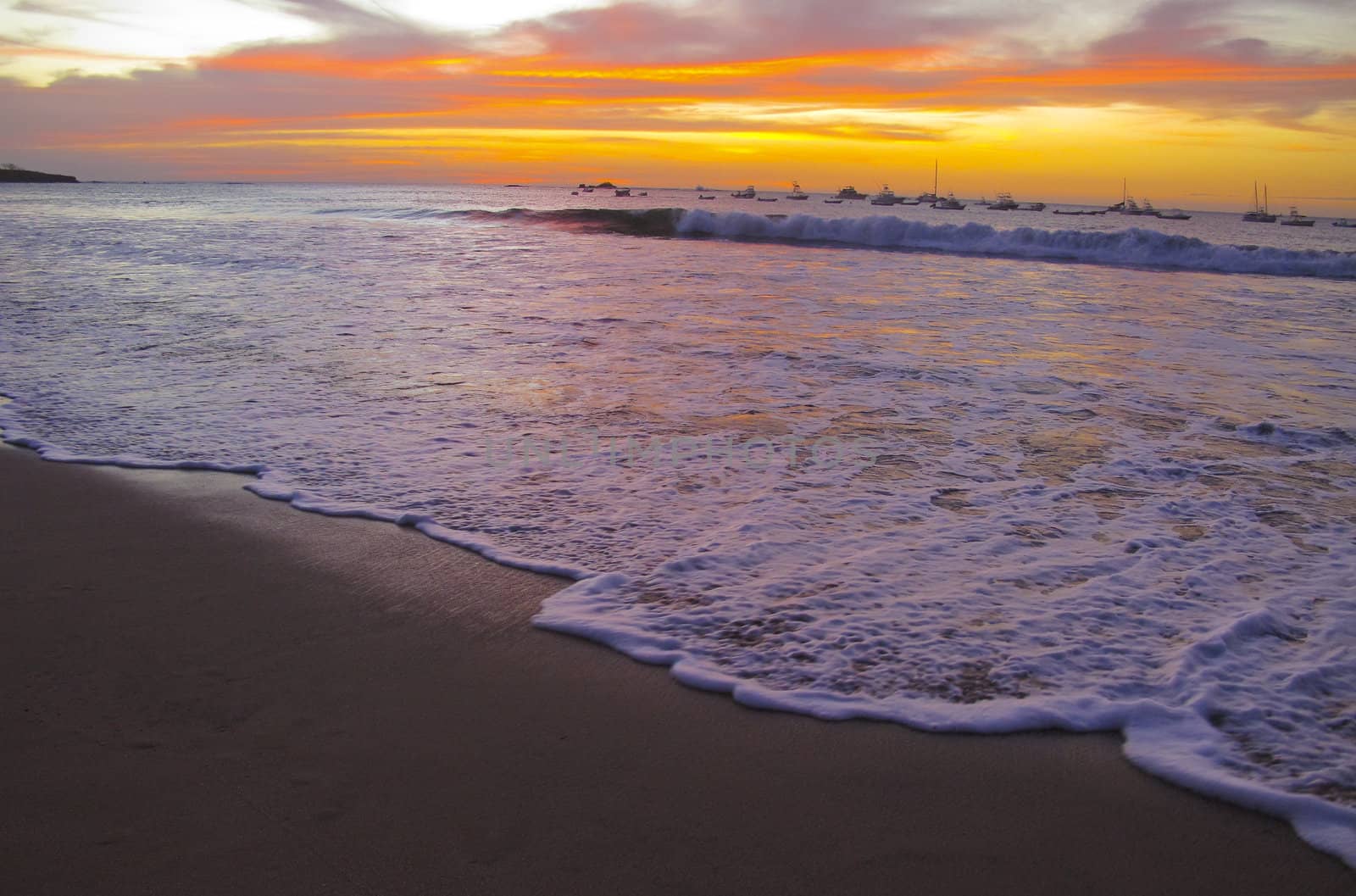Sunset in Costa Rica.  Toned sunset image with good depth of field and slow shutter to capture the motion of the ocean
