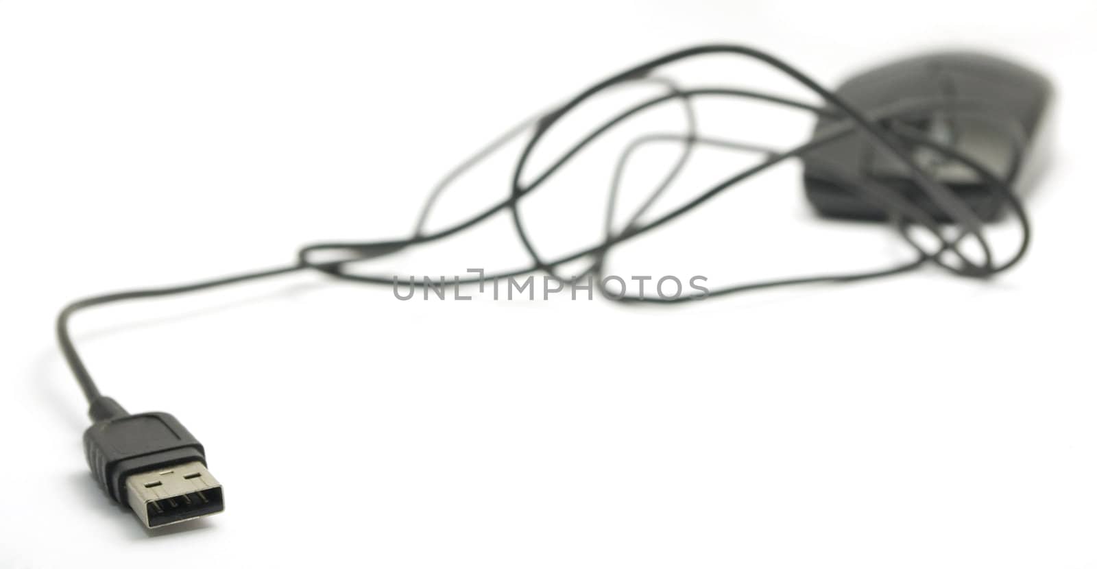 a usb mouse with focus on the tip of the wire, for technology or business background.