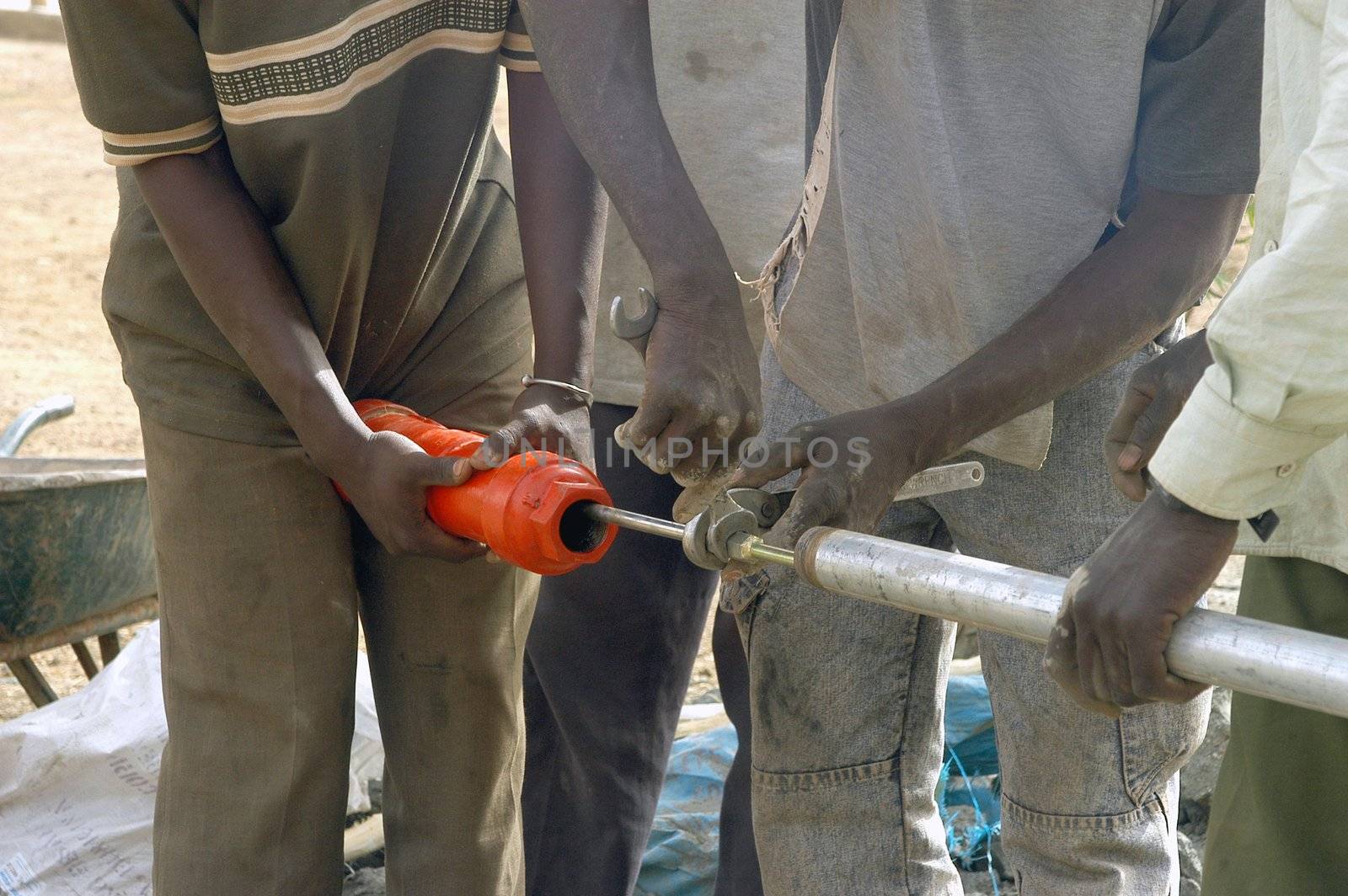 Water is not surfaces some in Africa, but with 40 meters under ground. Humanitarian associations finance and make install pumps in order to draw this water for the life of the village.                                 