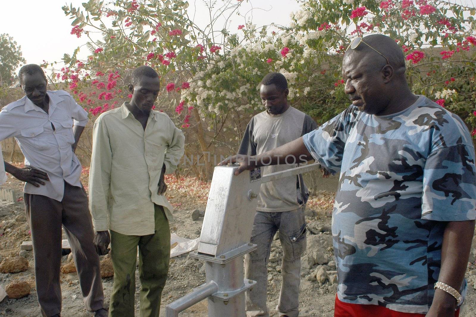 Water is not surfaces some in Africa, but with 40 meters under ground. Humanitarian associations finance and make install pumps in order to draw this water for the life of the village.                                 