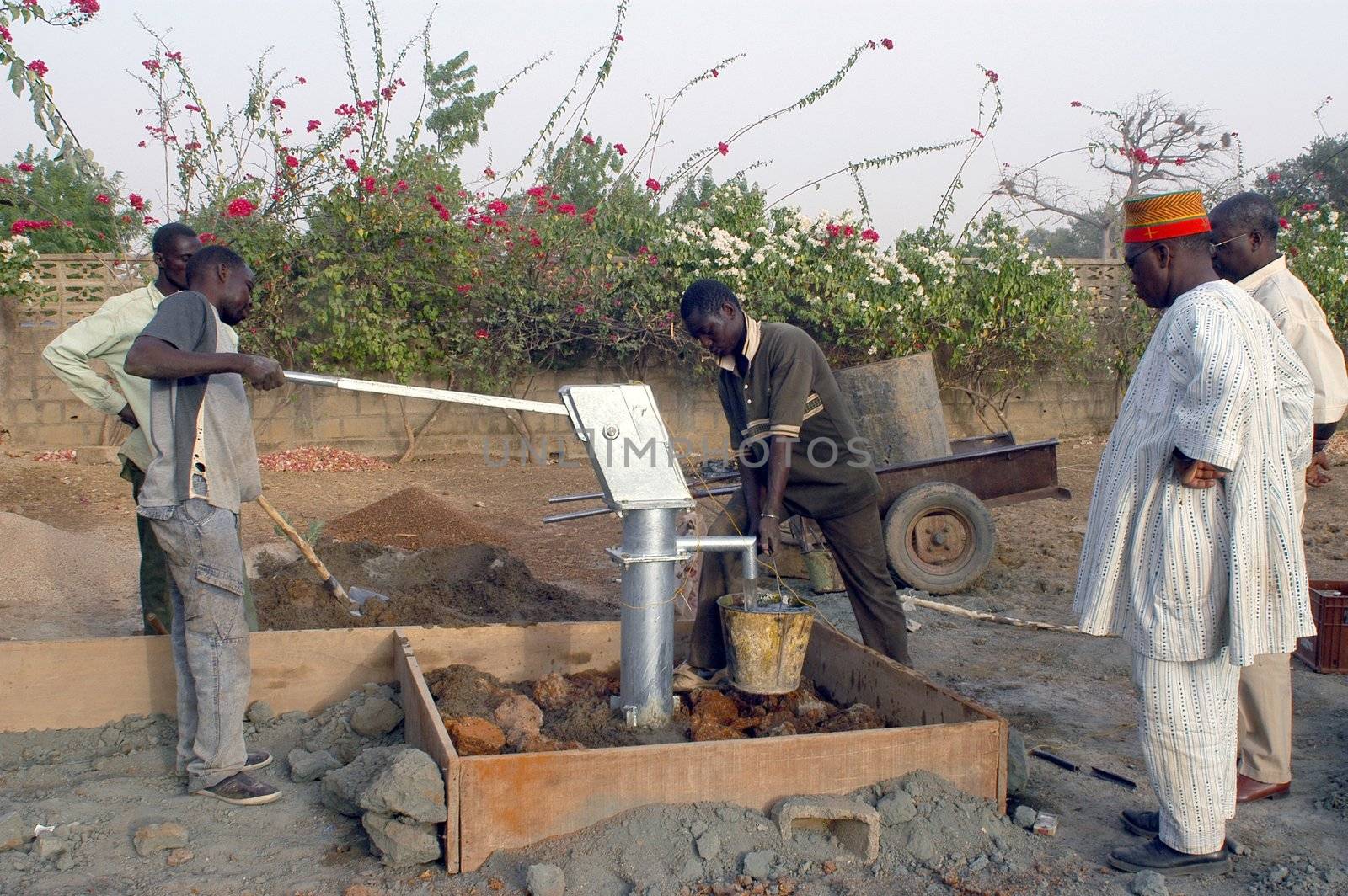 Water is not surfaces some in Africa, but with 40 meters under ground. Humanitarian associations finance and make install pumps in order to draw this water for the life of the village.                                 