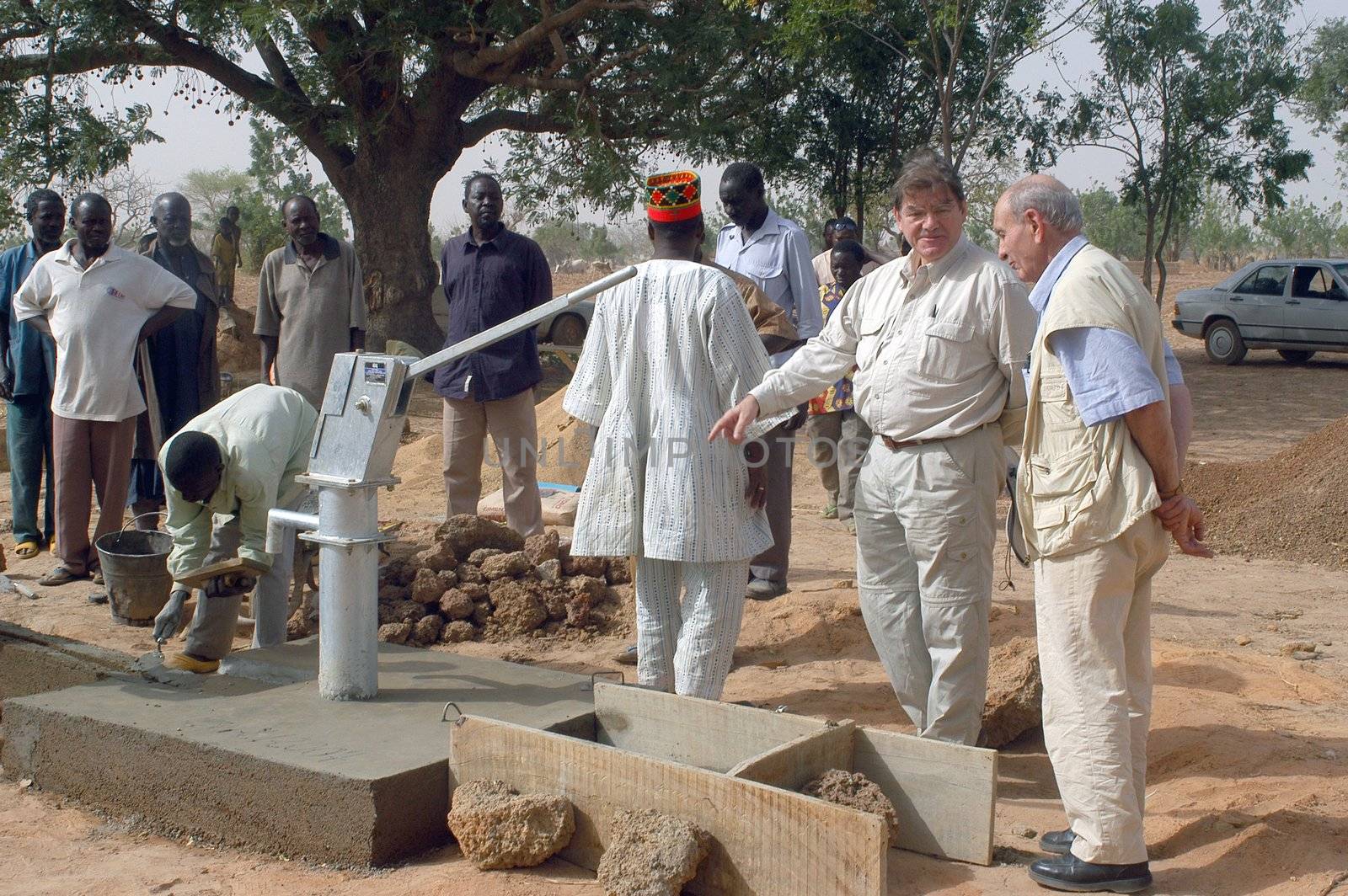 Water is not surfaces some in Africa, but with 40 meters under ground. Humanitarian associations finance and make install pumps in order to draw this water for the life of the village.                                 