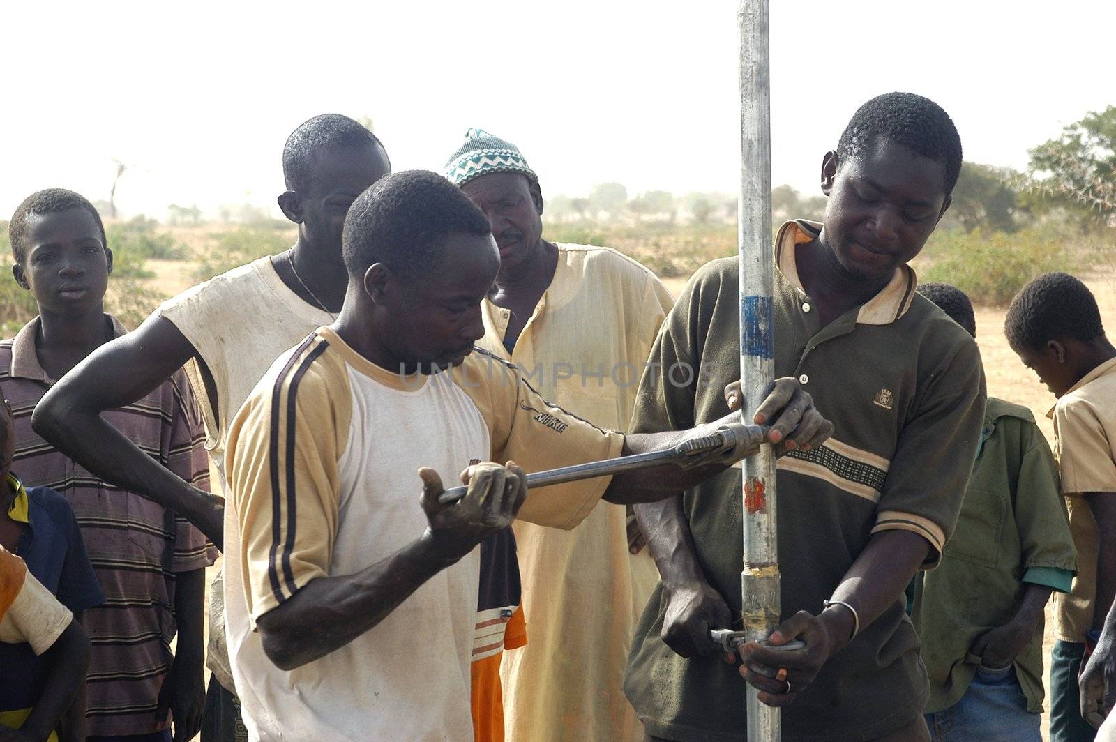 Water is not surfaces some in Africa, but with 40 meters under ground. Humanitarian associations finance and make install pumps in order to draw this water for the life of the village.                                 