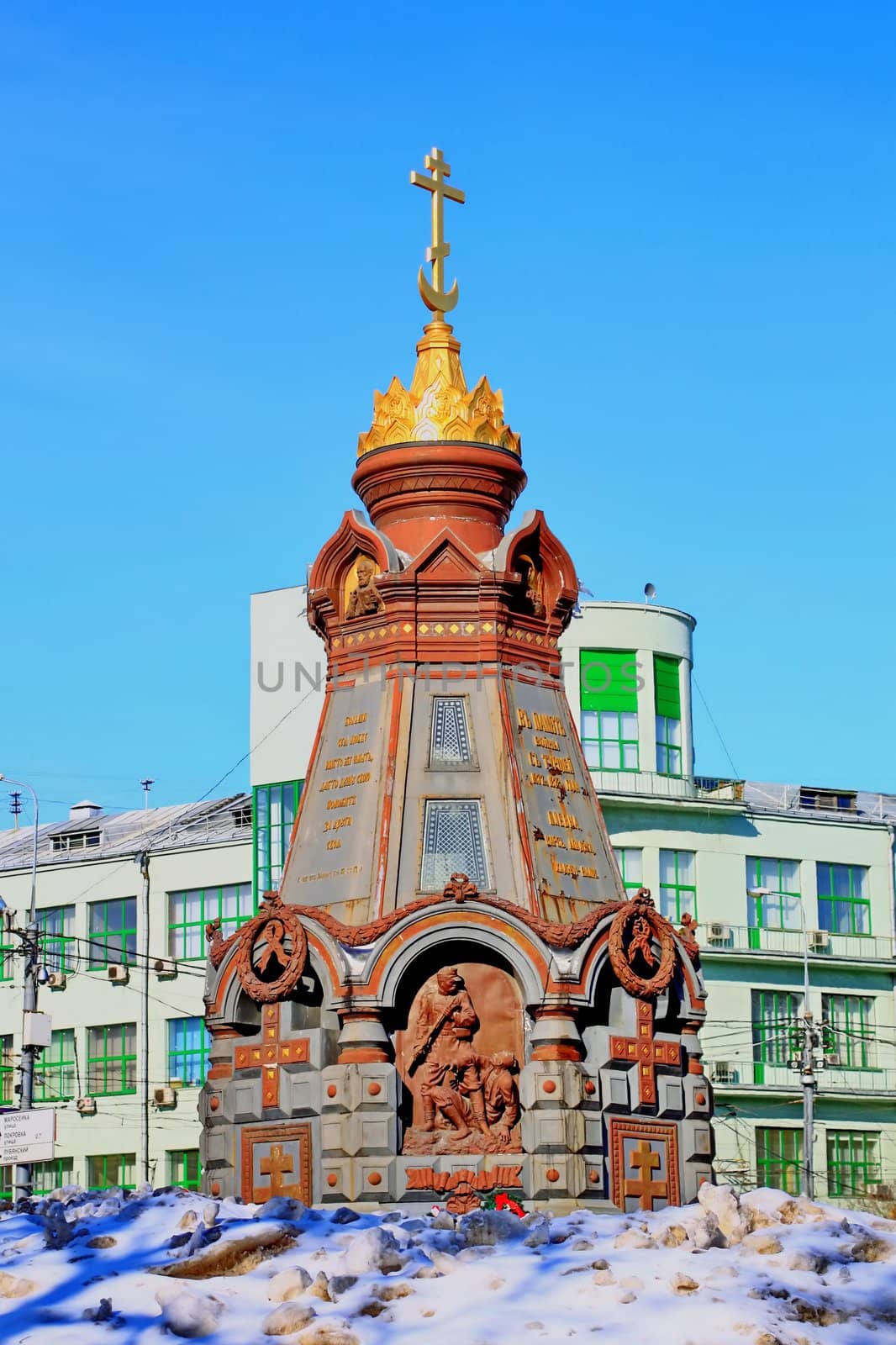 chapel-monument of brick in the center of Moscow with amazing 
architecture photographed in winter