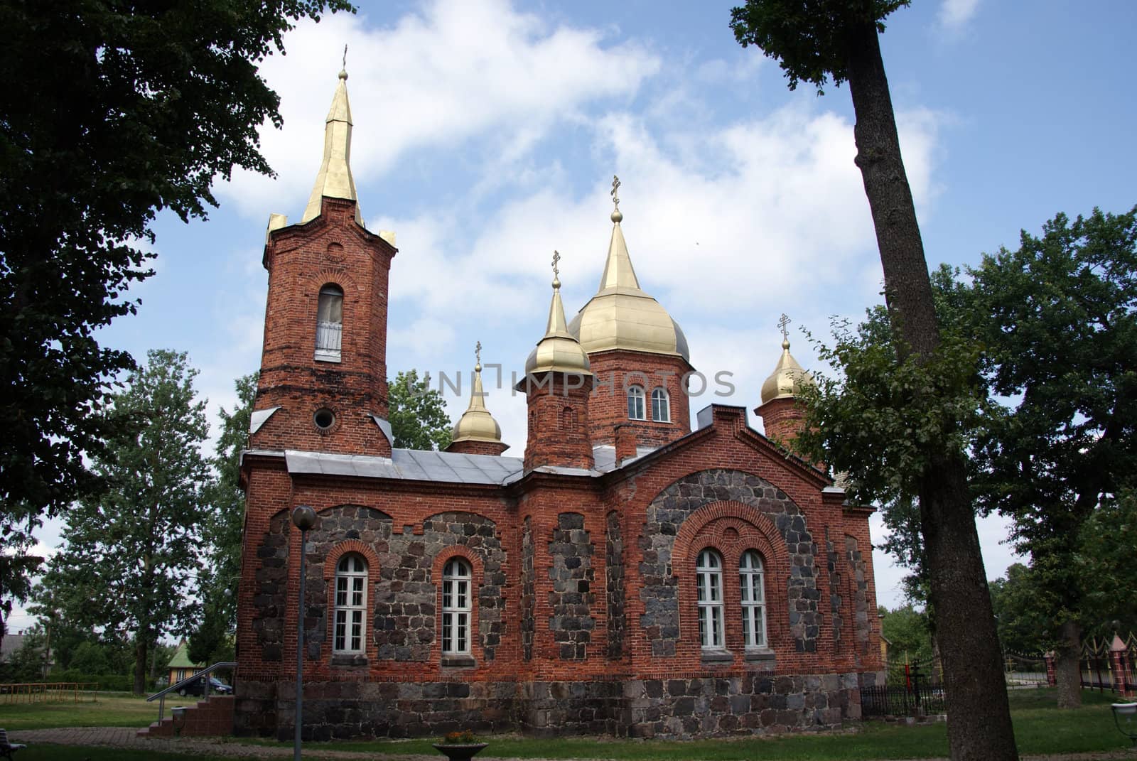 Estonia. Beautiful operating church on a background of the sky and clouds