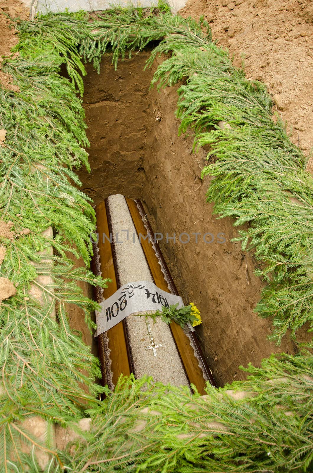 The coffin lowered into pits. Sometimes death visit us suddenly.