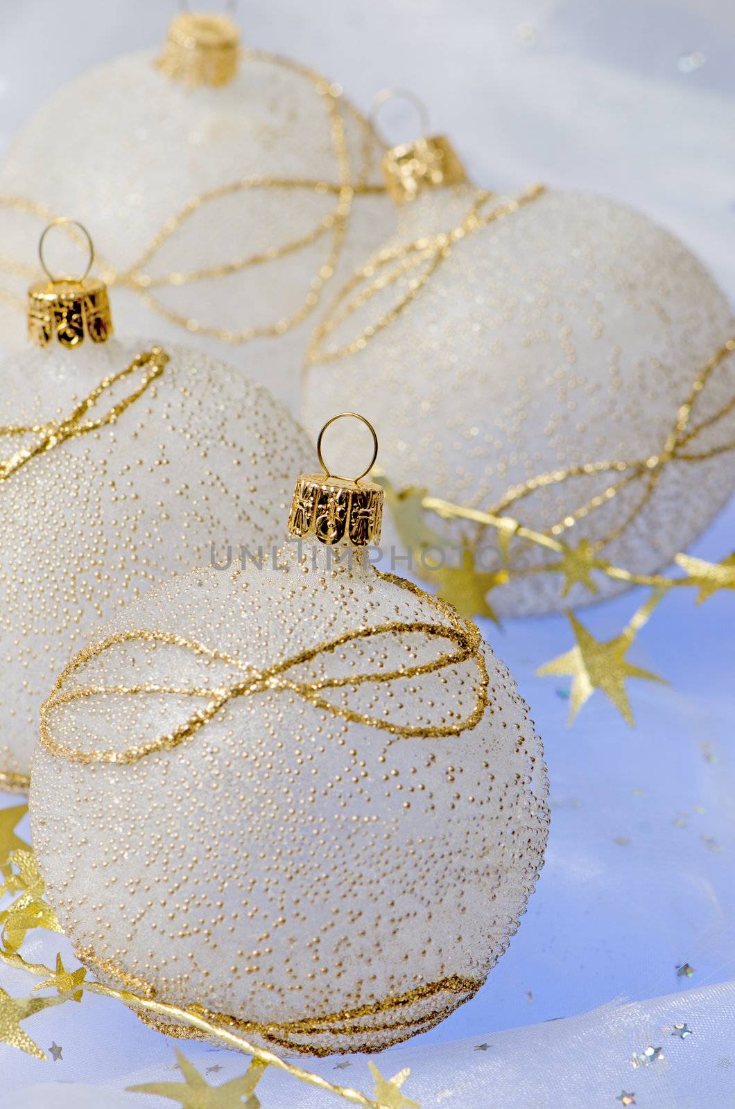 Christmas ball baubles with silver and gold decoration.