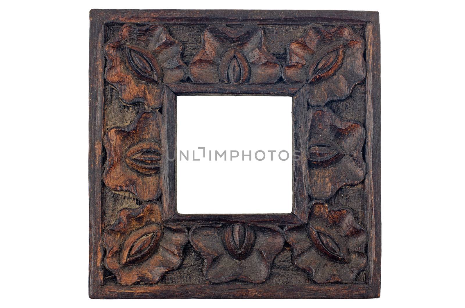 Carved wood picture frame isolated on white background.