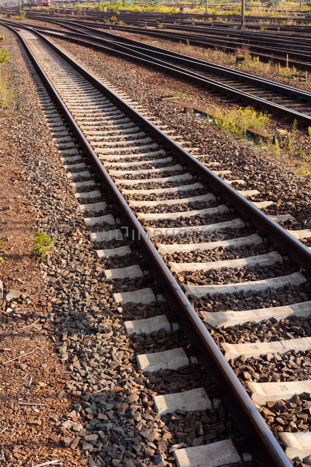 Railway Tracks and Switch near Train Station.