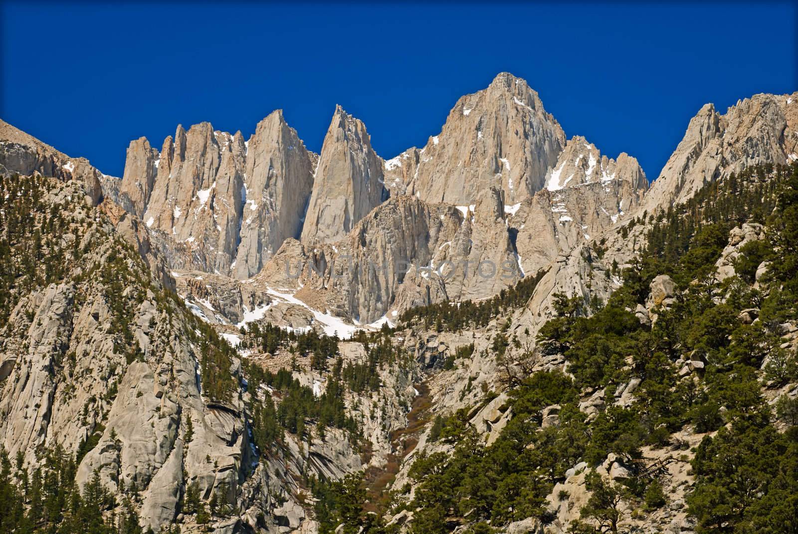Mt. Whitney (right) (elevation: 14,497 ft. above sea level, highest peak in Lower 48), seen from Whitney Portal Road, Inyo County, CA, USA by CharlesBolin