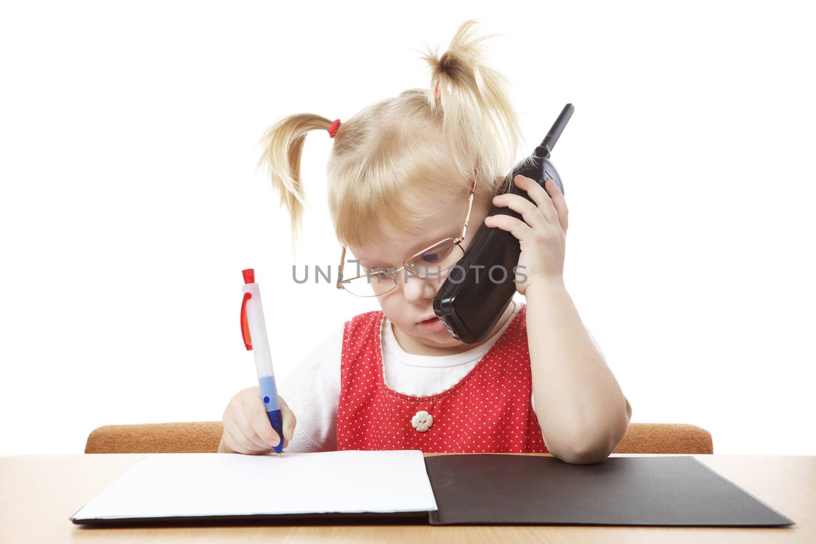 busy girl writing with telephone