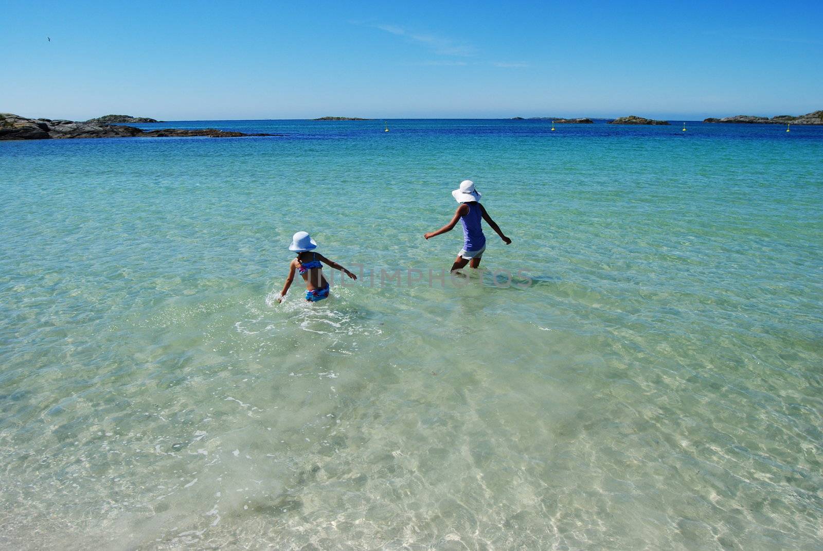 girls playing in the water