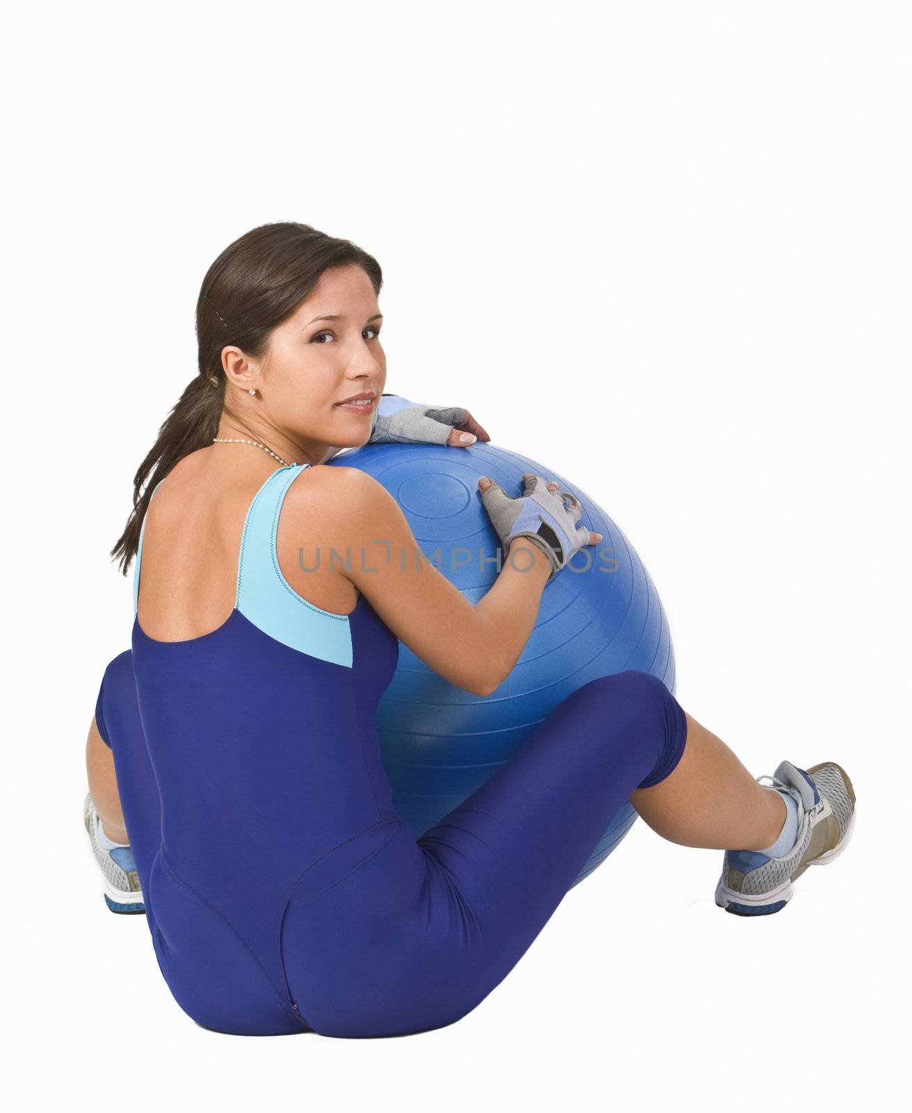 Woman sitting with a blue gym ball. Shot with Canon 70-200mm f/2.8L IS USM