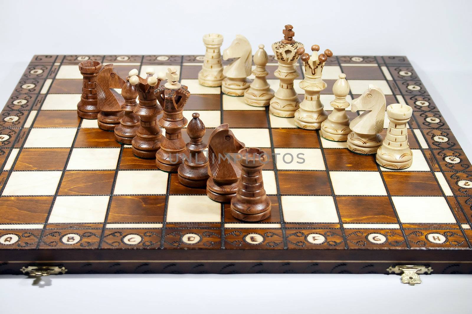 two lines of chessmen on chessboard