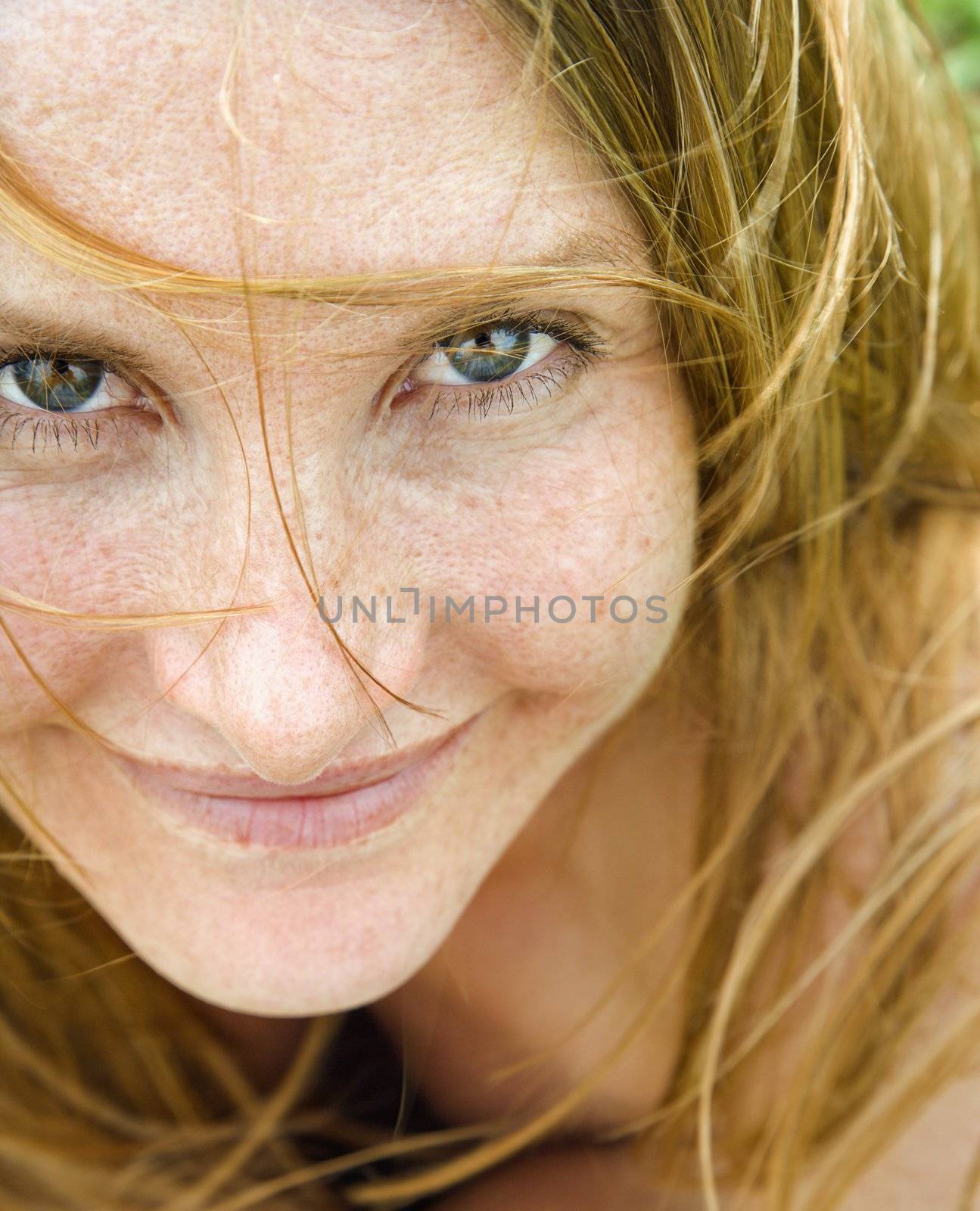 Female portrait up close. by iofoto