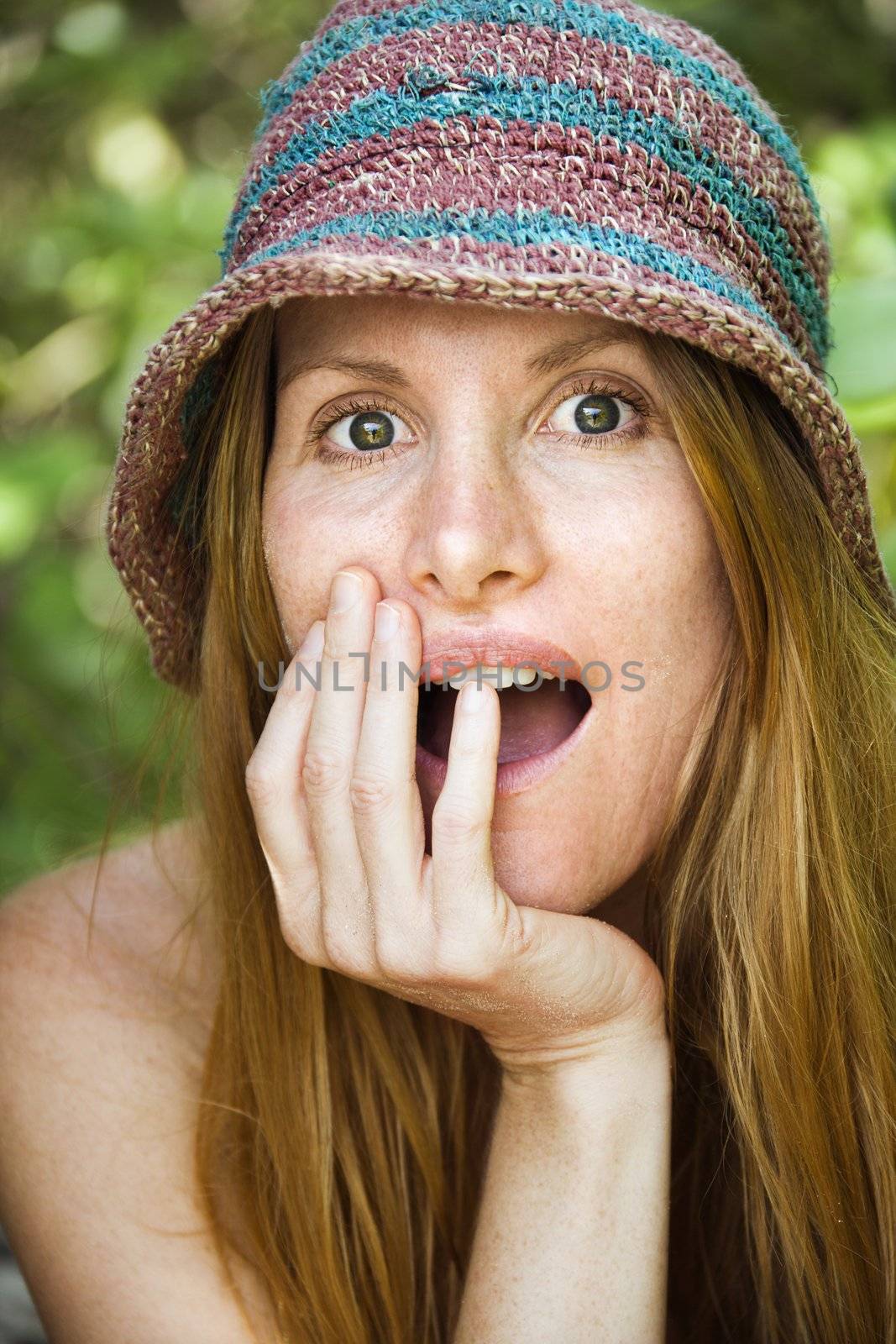 Portrait of surprised woman. by iofoto