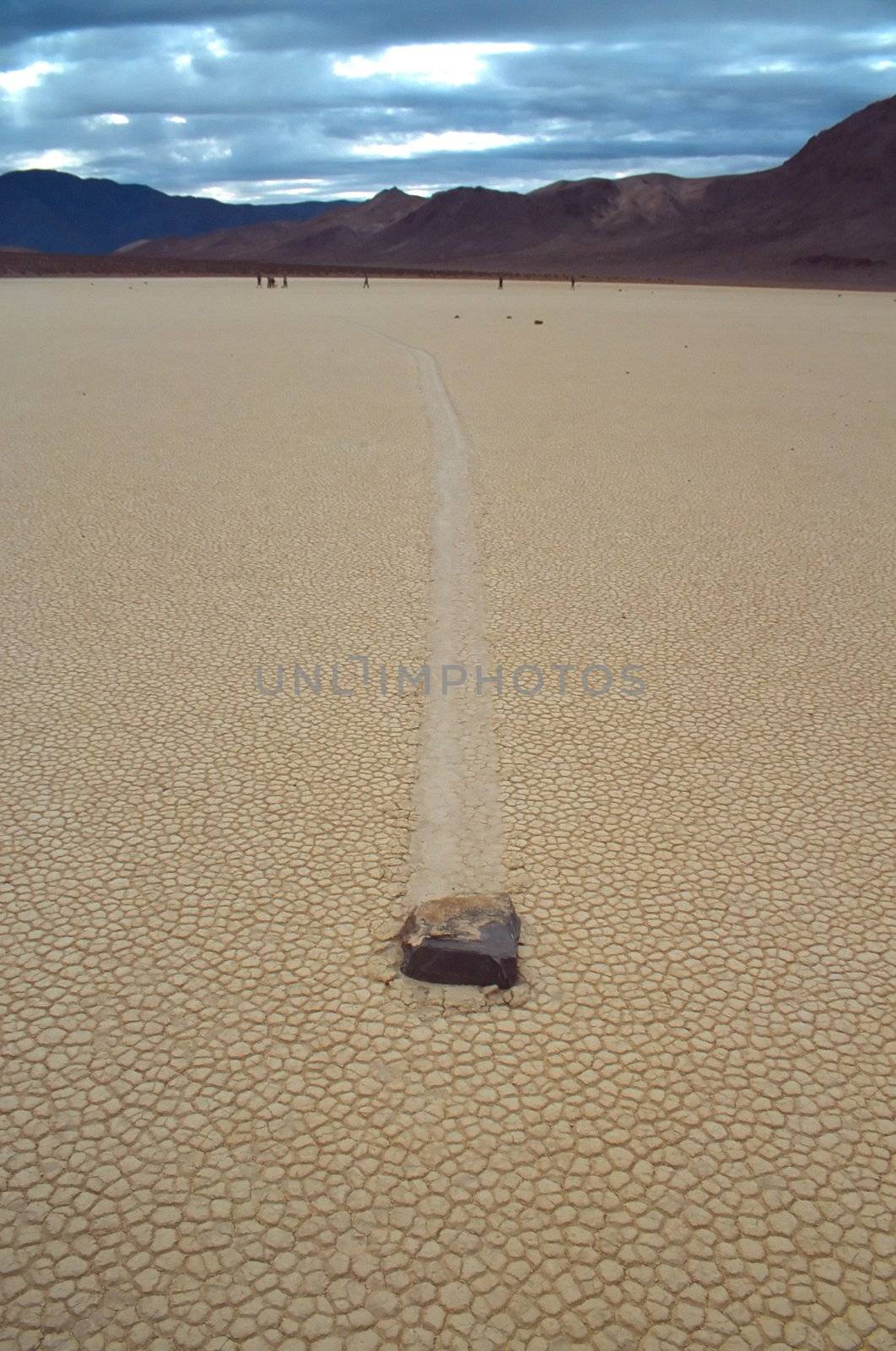 Racetrack Playa is a seasonally dry lake (a playa) located in the northern part of the Panamint Mountains in Death Valley National Park, California, U.S.A.. It is famous for 'sailing stones', rocks that mysteriously move across its surface.