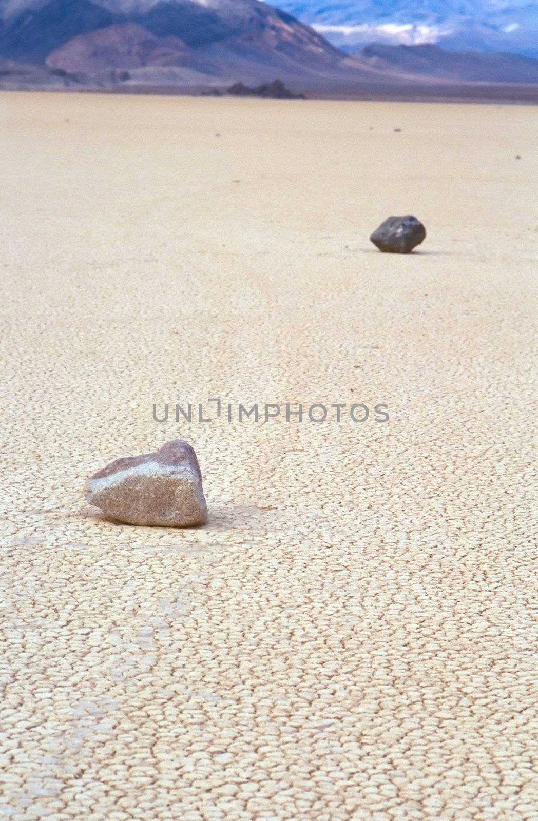 Racetrack Playa is a seasonally dry lake (a playa) located in the northern part of the Panamint Mountains in Death Valley National Park, California, U.S.A.. It is famous for 'sailing stones', rocks that mysteriously move across its surface.