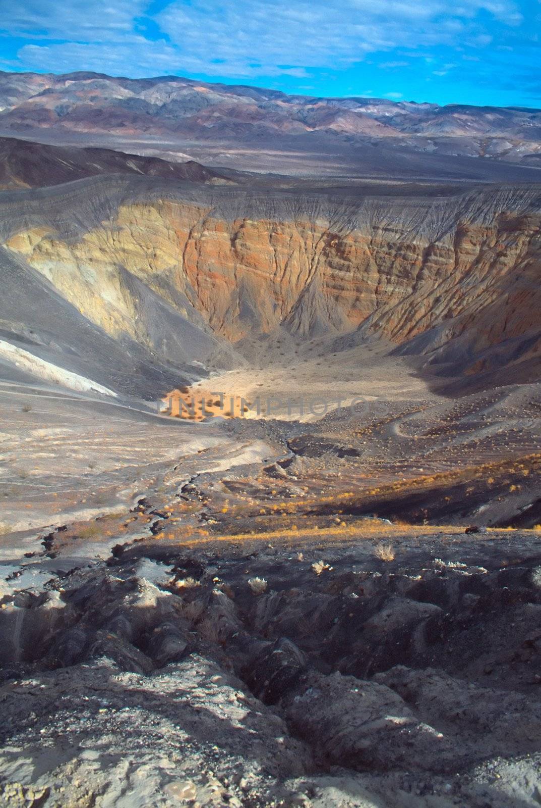 Ubehebe Crater is a large volcanic crater located at the north tip of the Cottonwood Mountains