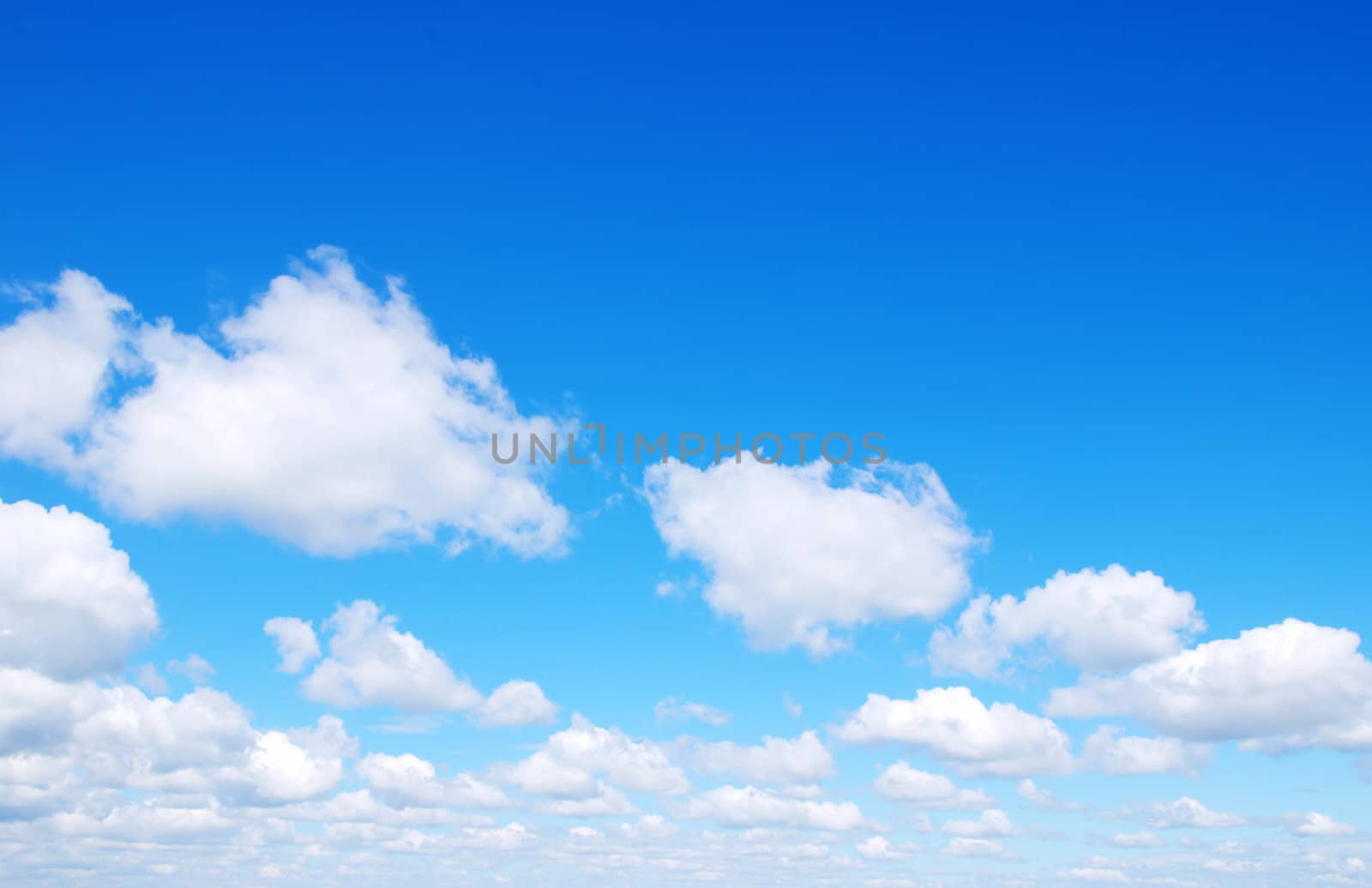 blue sky with clouds and sun