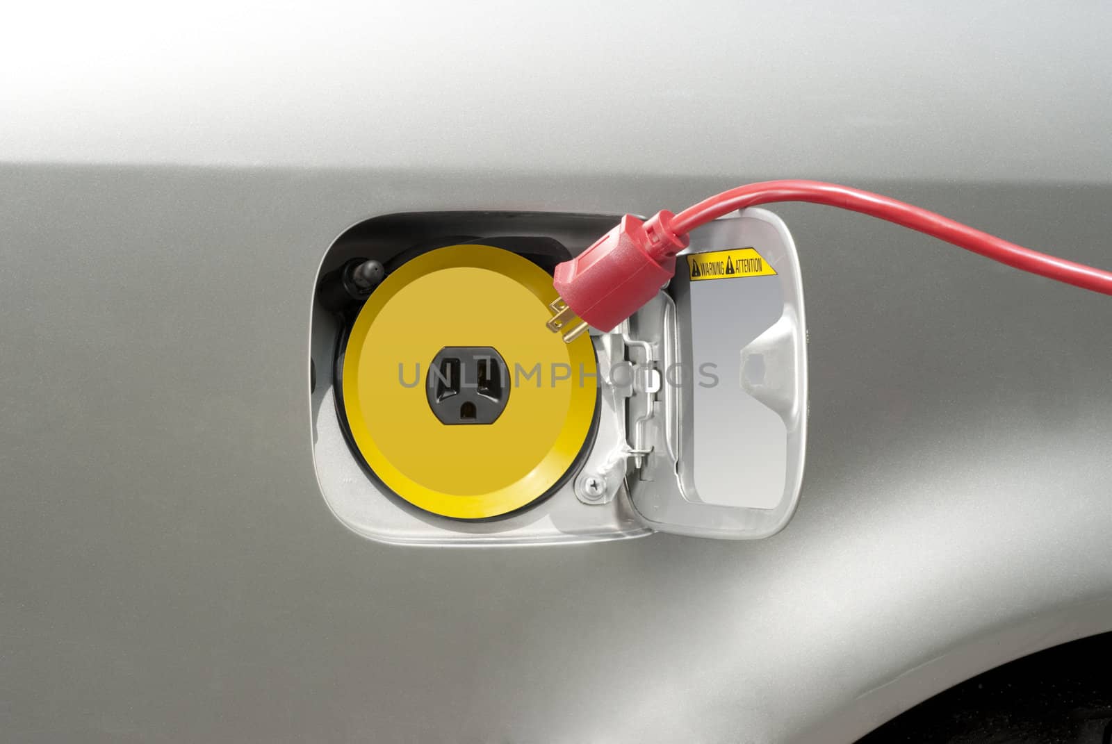 Household electric cord plugging into an electric vehicle