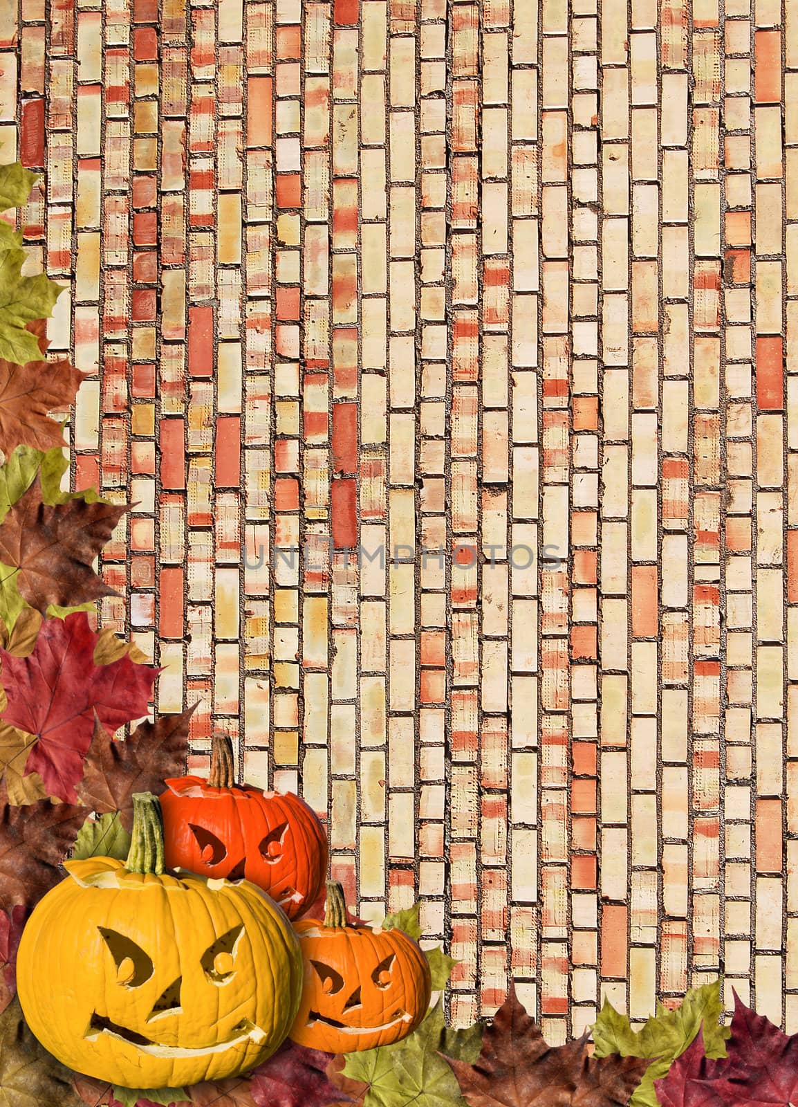 Fall leaves with pumpkin on wall Brick brown background