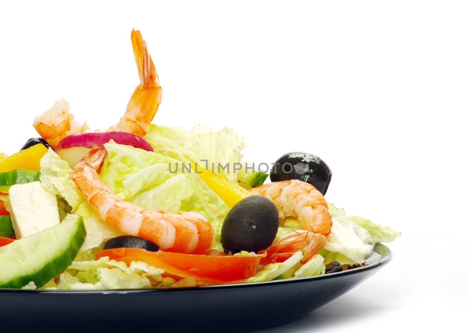vegetable salad in plate on white