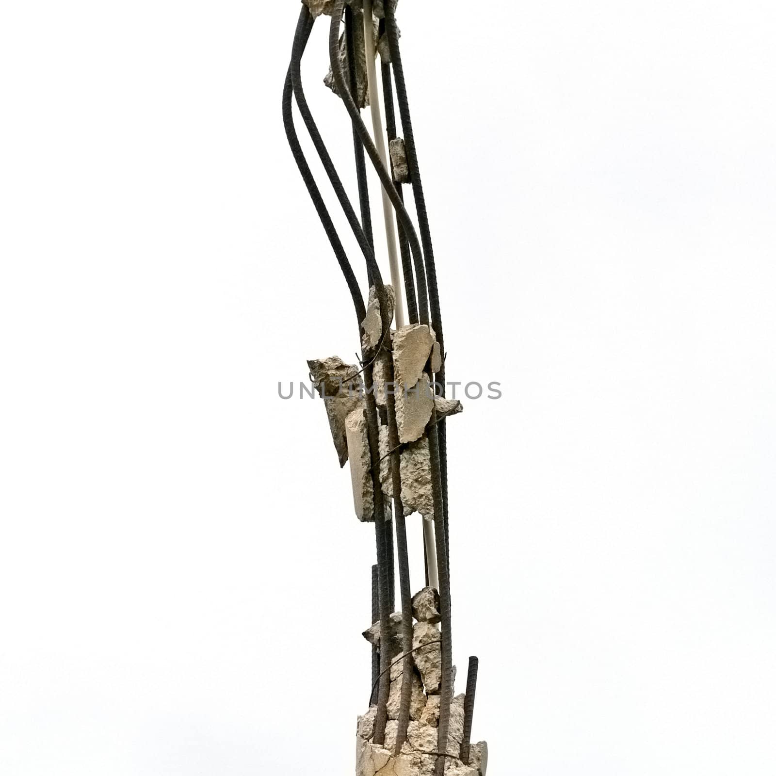 Rusty steel bars and broken concrete. Industrial detail.
