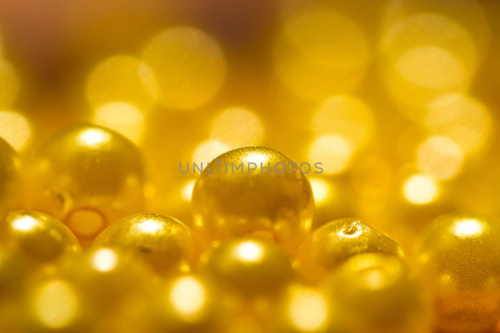yellow beads under sun lights turn to golden in my viewfinder