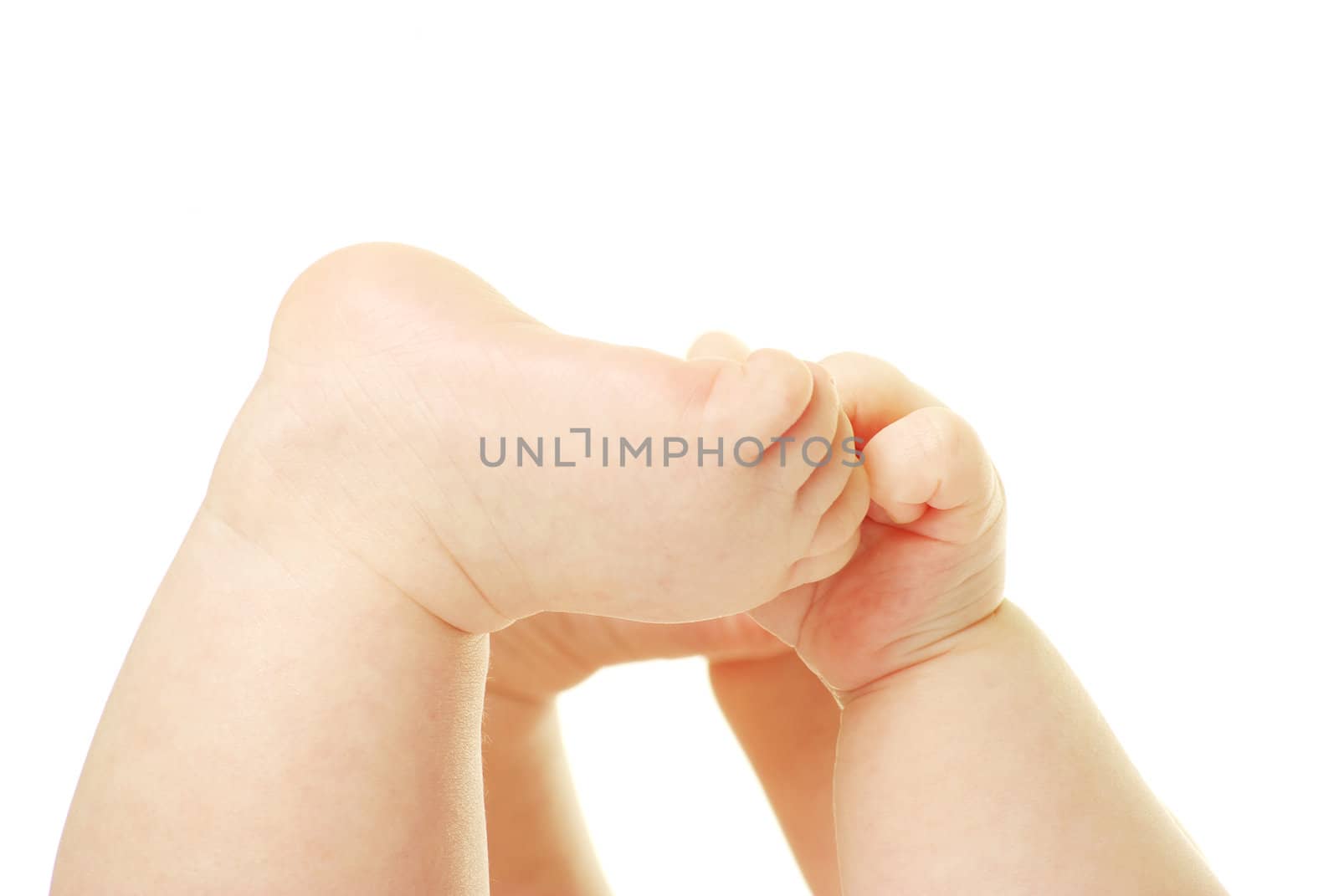 newborn baby feet and hands isolated on white