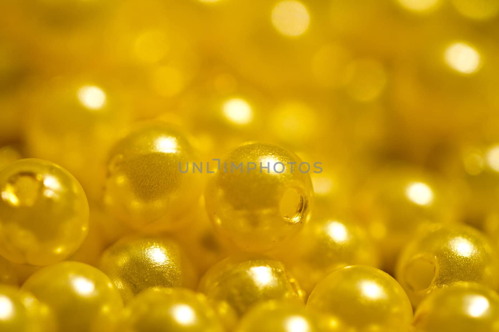 yellow beads under sun lights turn to golden in my viewfinder