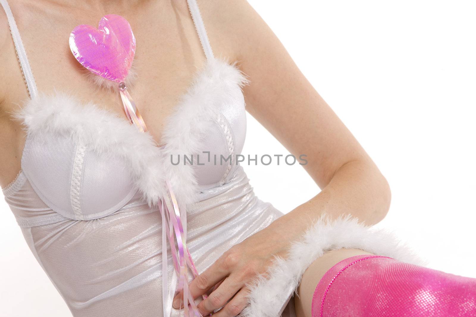 detail of woman holding pink heart