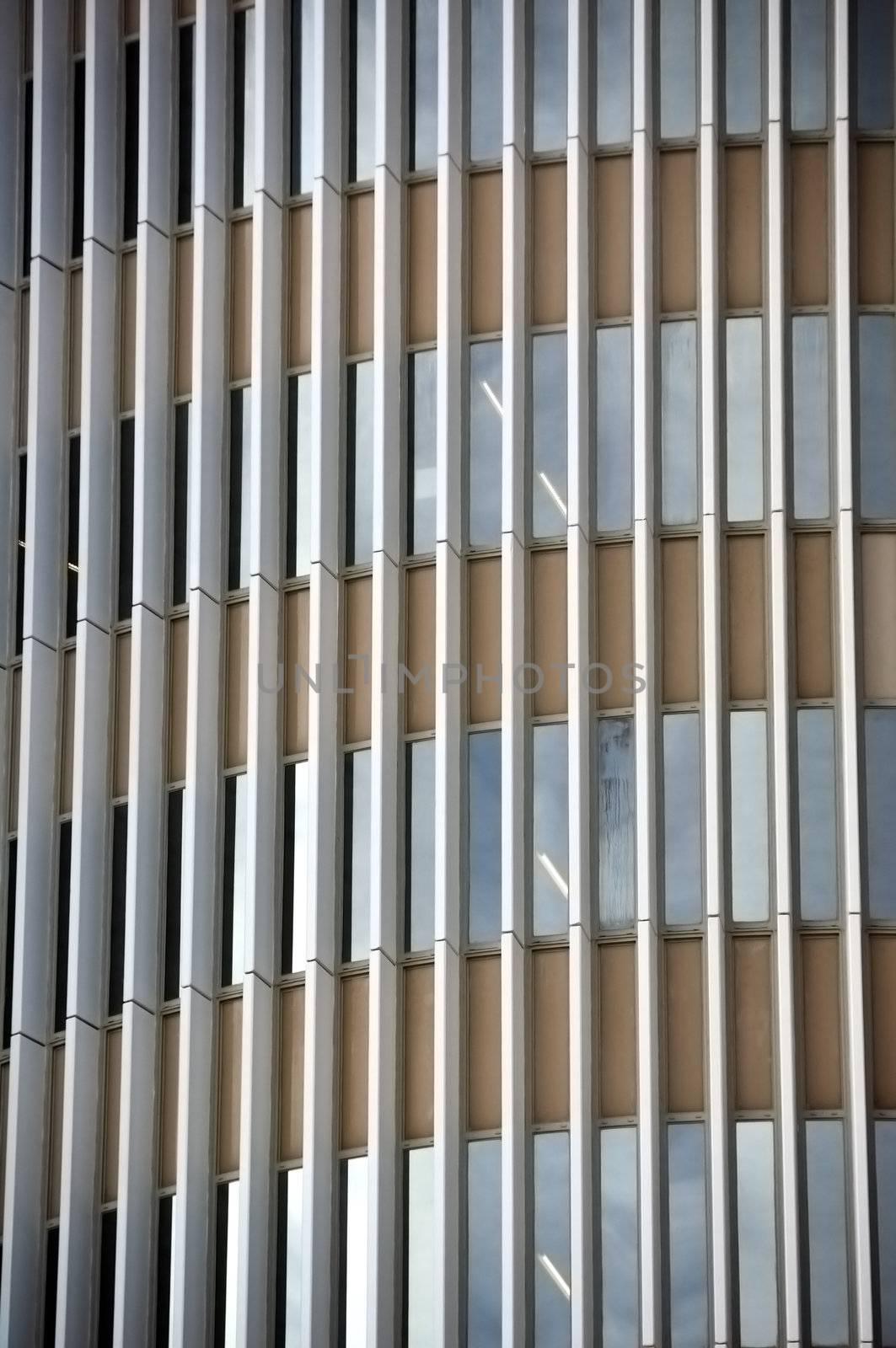 Glass facade of a modern office building. Architectural detail.