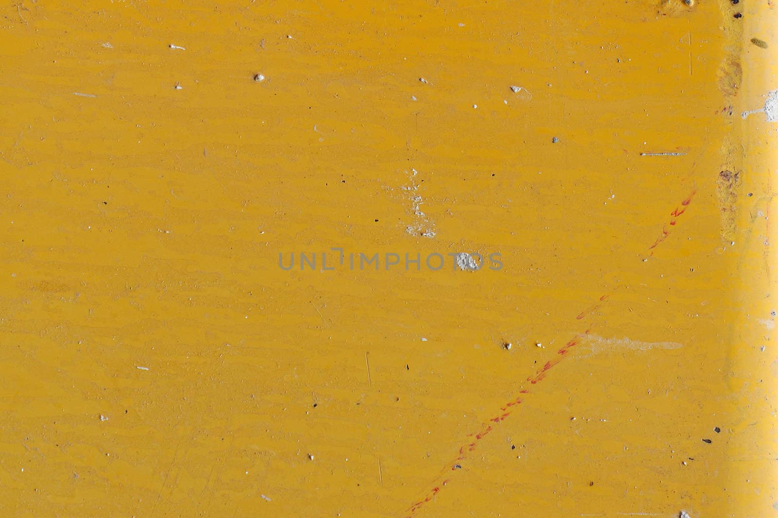 Yellow painted metal background. Grungy industrial texture.