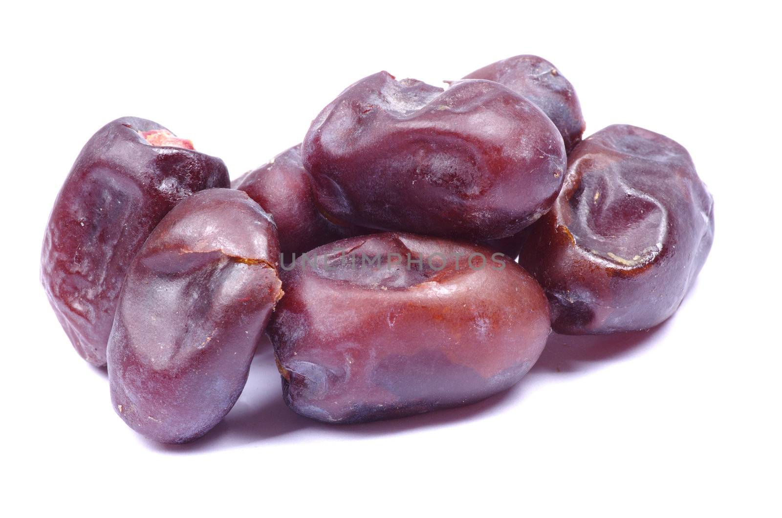 dryed dates on white background