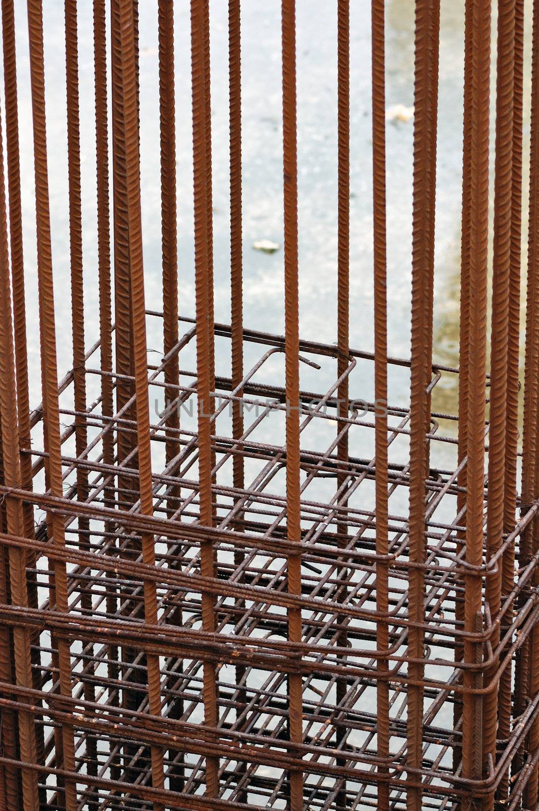 Rusty metal reinforcement bars mesh at construction site.