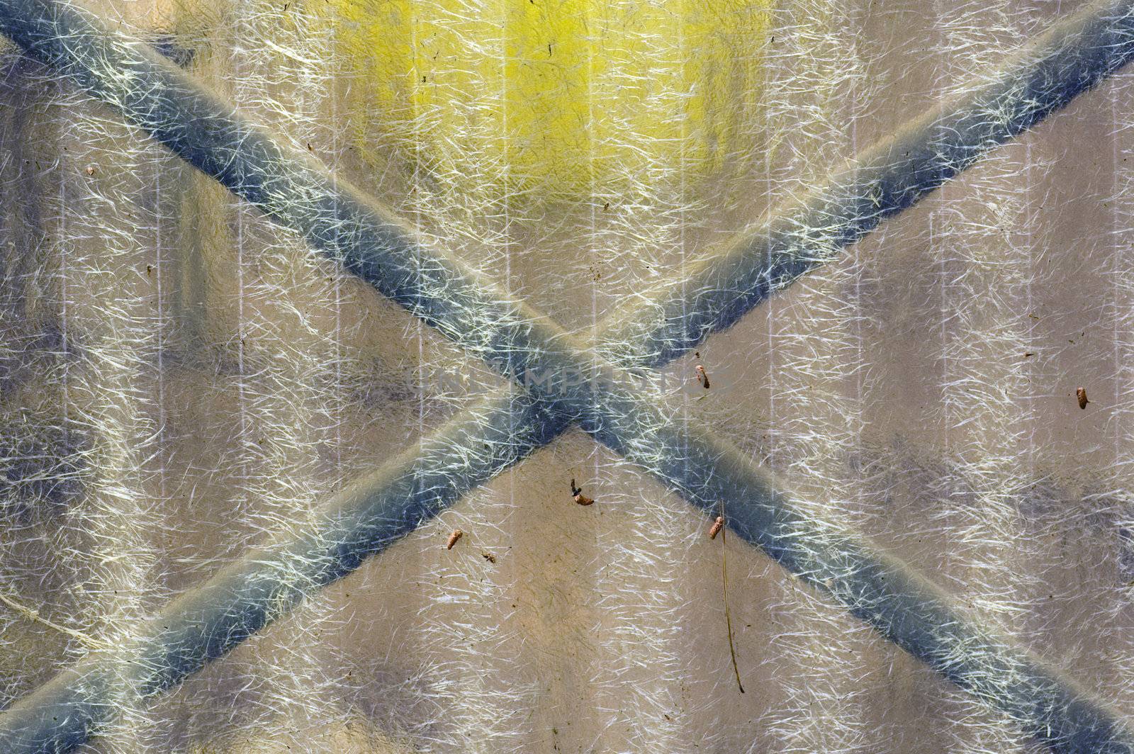 Corrugated transparent plastic sheeting. Abstract grungy background.