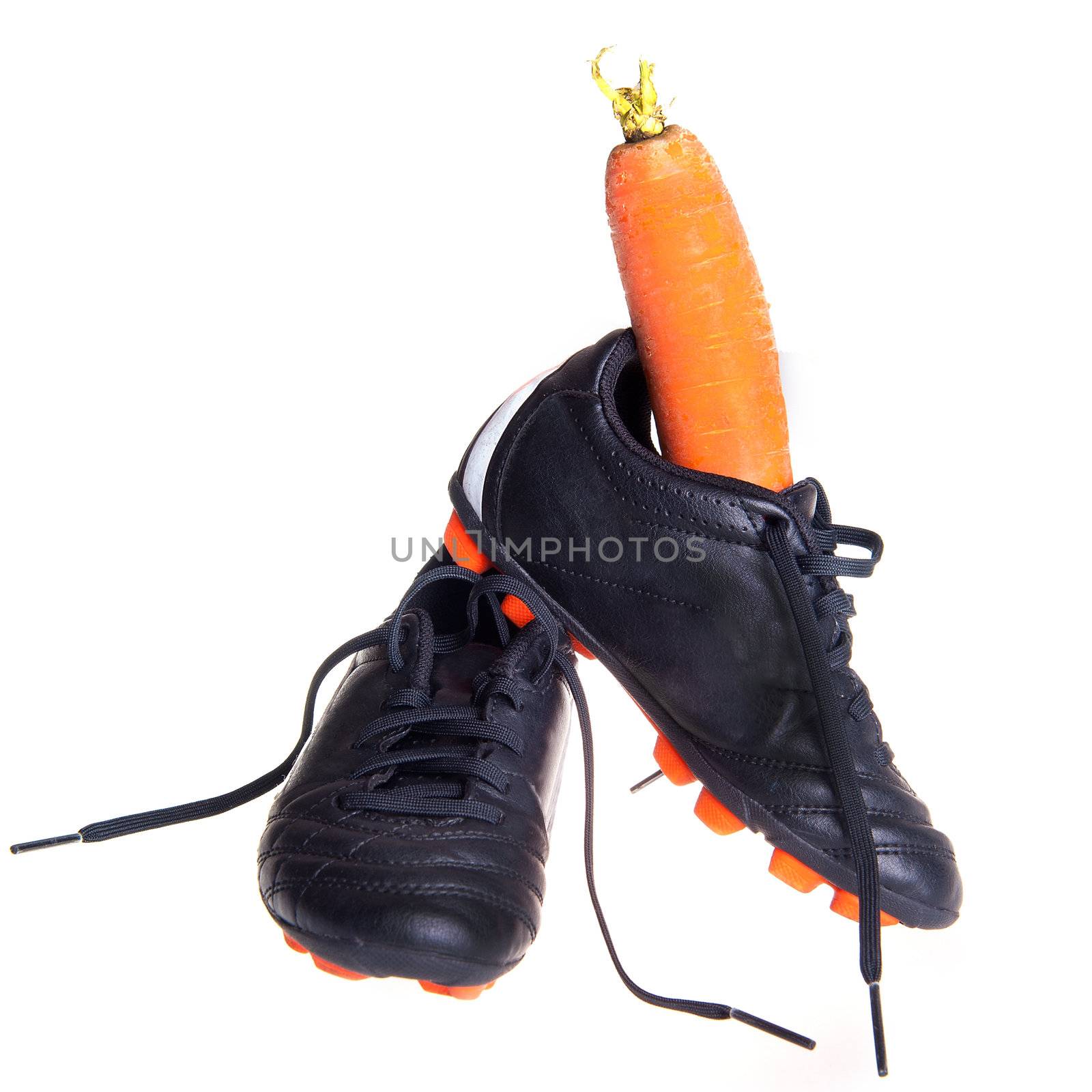 Football shoes with a carrot, for the dutch holiday called "sinterklaas"