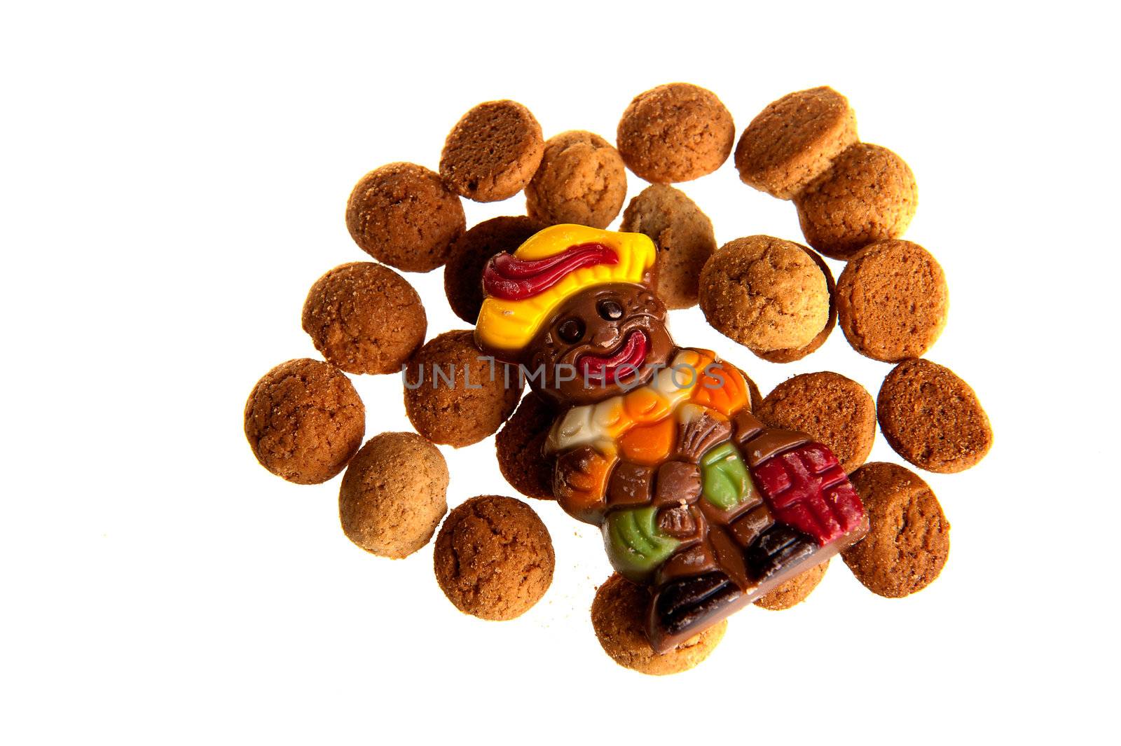 Sweet candy -gingernuts- and a chocolate 'piet' for a dutch holiday called 'sinterklaas'