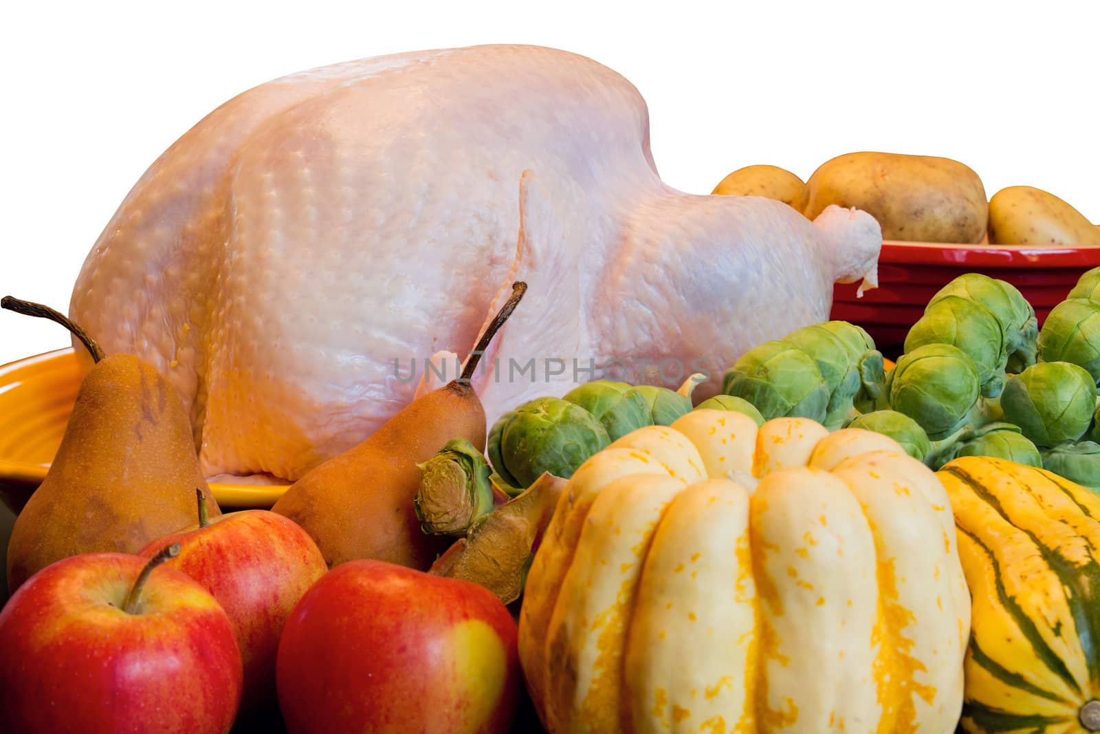 Thanksgiving Turkey Dinner Cooking Ingredients with Squash Apples Brussels Sprouts Pears and Potatoes Closeup