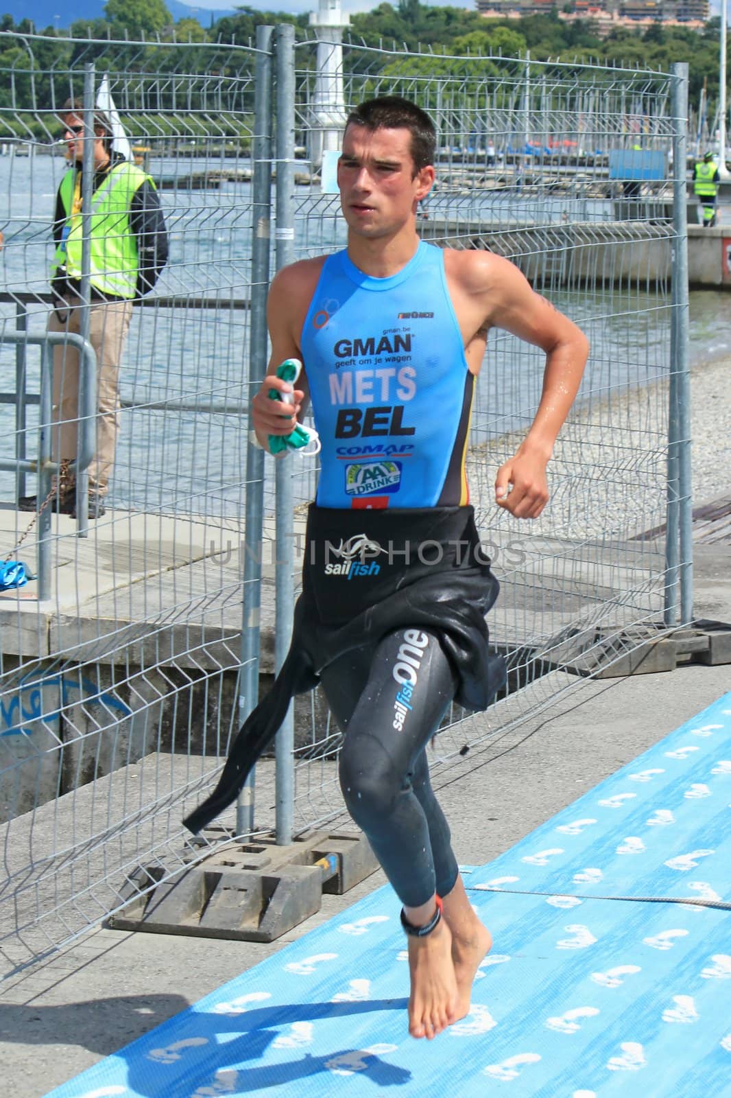Male runner in the transition area after the swim race at the Geneva International triathlon, on July 24, 2011, Geneva, Switzerland