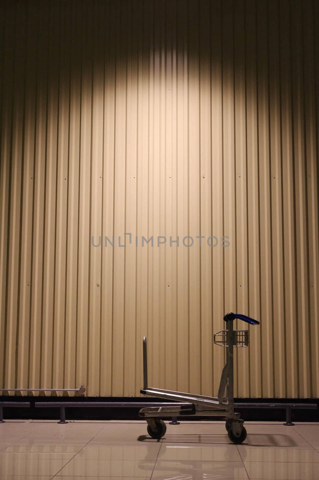 A trolley is left behind in a warehouse