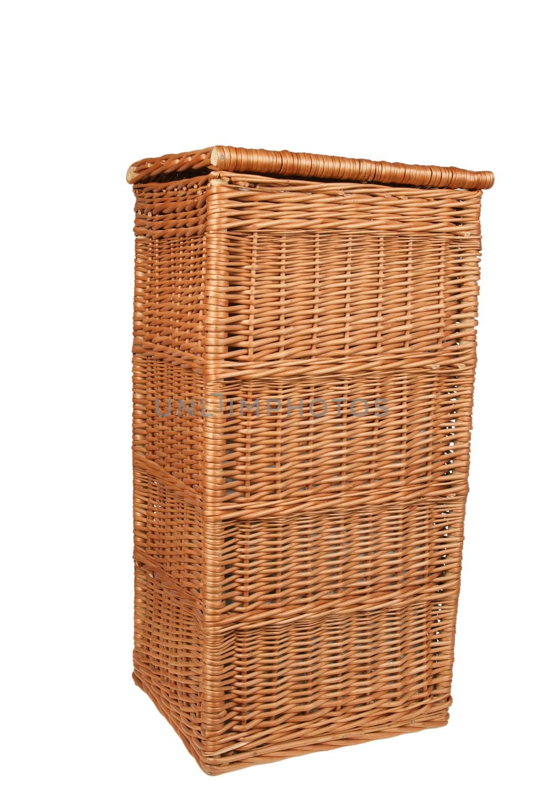Brown wicker basket isolated on white background close up