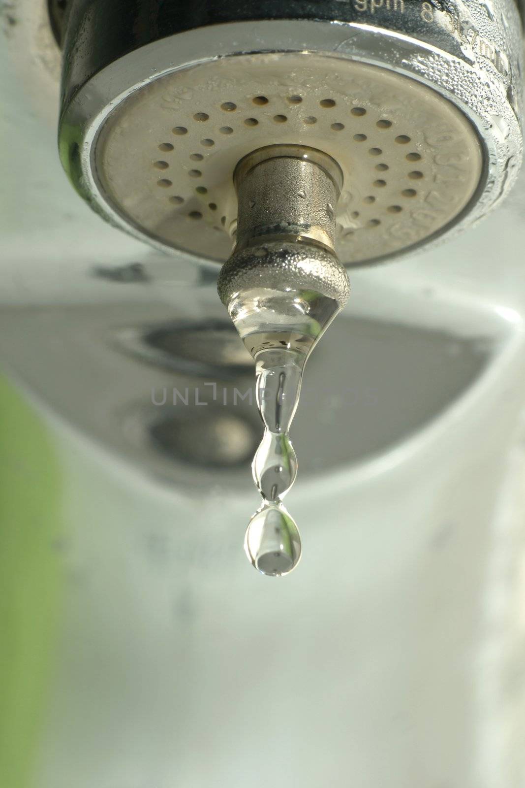 Close-up of water drop on e tap